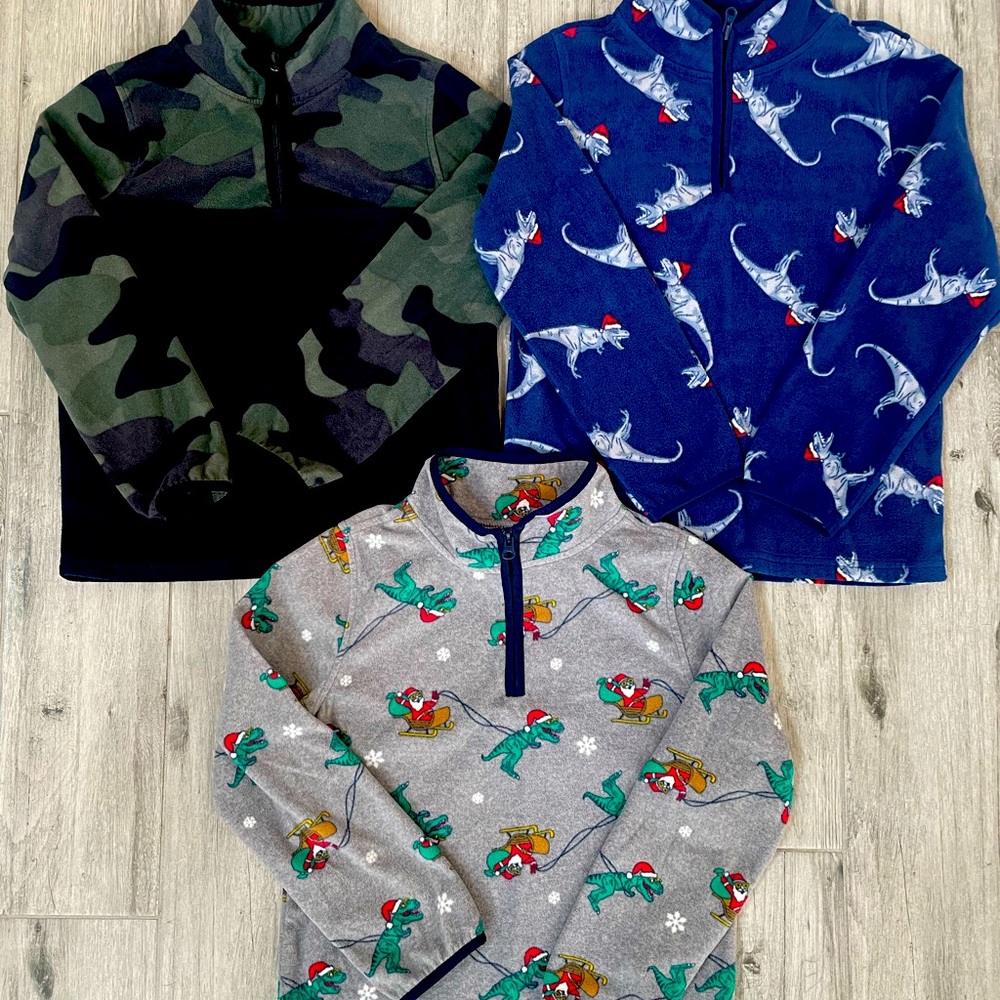 Three Oshkosh B’gosh fleece sweaters. Like new condition. $40 for all.